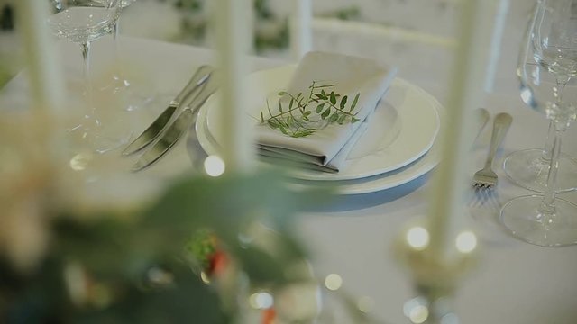 Wedding details. Beautiful flowers decration. Floral composition.Candles on the decorated table.