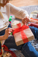 Woman wrapping christmas present