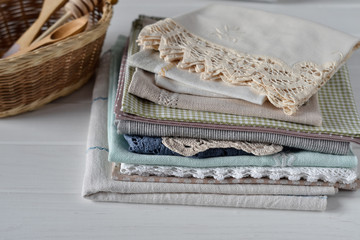 Obraz premium Different rustic linen napkin top view on white background 