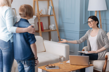 Friendly psychologist welcoming her clients