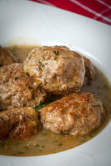 Pork meatballs with dill sauce.
