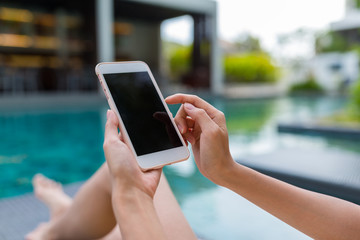 Using mobile phone on the swimming pool