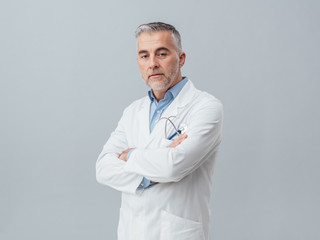 Confident doctor posing