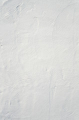 Whitewashed white painted textured wall background.