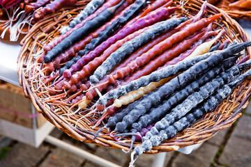 Churchkhela in the street market in Georgia. Churchkhela is a traditional sausage-shaped candy originating from Georgia