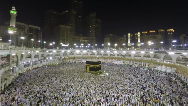 Time lapse video of Muslim pilgrims circling around the holy Kaaba at night during Hajj inside al Masjid al Haram in Mecca, Saudi Arabia.