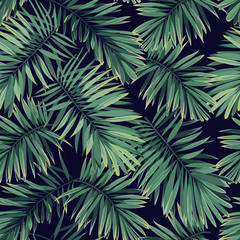 Fototapeta premium Dark tropical pattern with exotic plants. Seamless vector tropical pattern with green phoenix palm leaves.