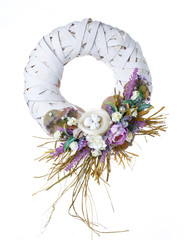 decor braided wreaths of flowers on white background. top view