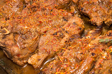 Roasted chopped lamb steak with saffron and spices.