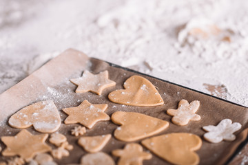 'Close-up view of uncooked homemade cookies on baking paper