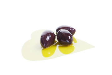 Heart of Olive Oil and Green Olives Isolated on White