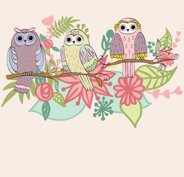 Card with cartoon owls in bright colors.