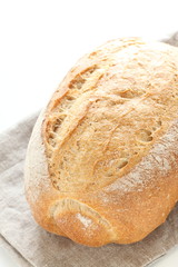 French bread on linen cloth