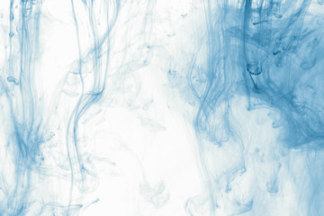 Smoke abstract background cloud of paint on white. Color ink drop in water
