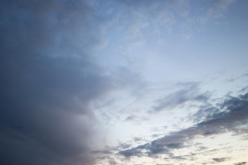 Naklejka na ściany i meble Blue sky with clouds during sunset.