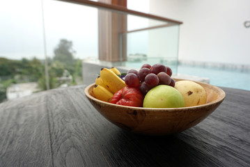 variety of fruits in the timber bowl