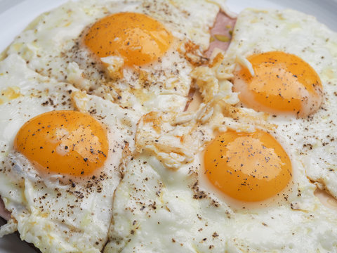 Four fried eggs