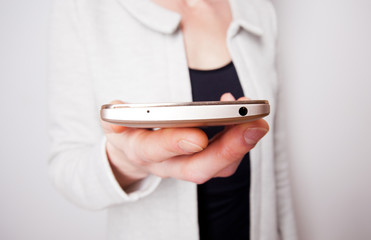 smartphone in a woman's hands