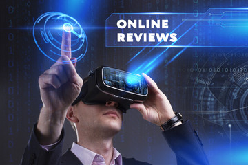 Business, Technology, Internet and network concept. Young businessman working in virtual reality glasses sees the inscription: Online reviews