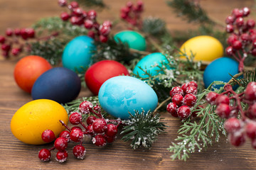 Fototapeta na wymiar Easter eggs on wooden background.