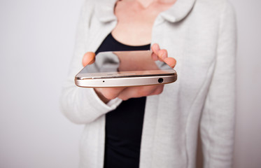 smartphone in a woman's hands