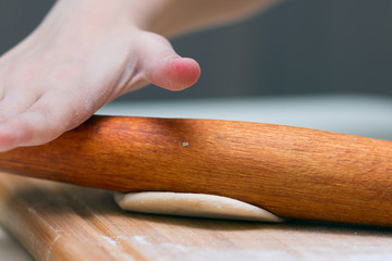 Cooking of the dough. Buns with sausage.