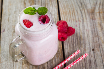 Raspberry jogurt smoothie in glass jar