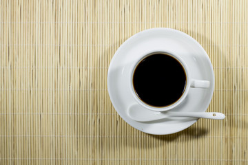 Obraz na płótnie Canvas Hot coffee on wooden table