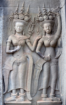 Ancient reliefs with Apsaras at Angkor Wat Temple, Cambodia
