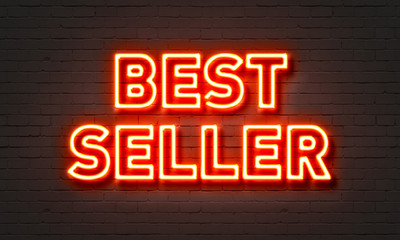 Bestseller neon sign on brick wall background.