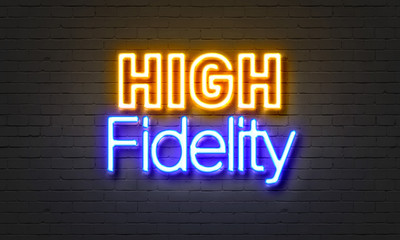 High fidelity neon sign on brick wall background.