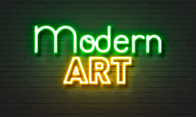 Obraz premium Modern art neon sign on brick wall background.