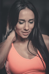 portrait of beautiful sexy girl on background of gym