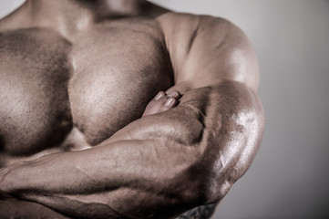 Naklejka premium Brutal caucasian handsome fitness men on diet training chest pumping