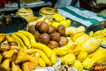 Fried bananas and cakes. Street food