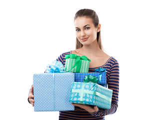 Young beautiful woman holding gift boxes isolated on white background