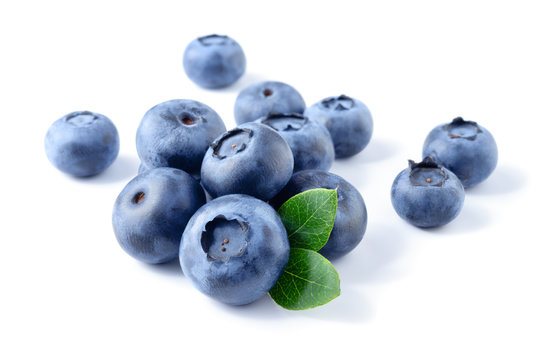 Blueberry. Fresh berries with leaves isolated on white background.