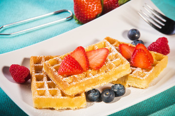 Fresh waffles with strawberries