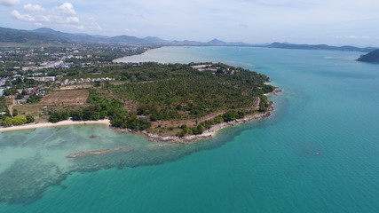 Obraz na płótnie Canvas Aerial drone photo of the sea and coastline of Rawai beach in Phuket, Thailand