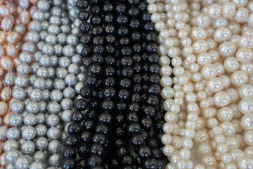 Multicolored pearl beads on the market