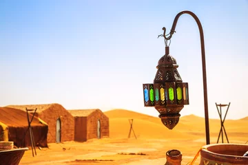 Gordijnen coloreful berber lamp with traditional nomad tents on background © GoodPics