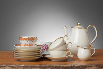 Vintage Tea Cups on a wooden Table - Gray Background - Horizonzal, Simple Studio Still-life