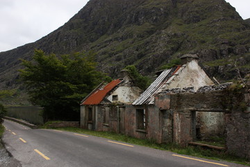 Fototapeta premium Derelict Houses side of the road in Ireland 