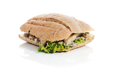 Healthy chicken and mushroom sandwich over white background