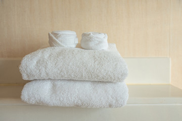 Obraz na płótnie Canvas Towels stack in bathroom of a hotel