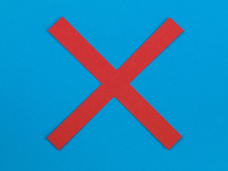 Obraz premium Illustration of a Red Cross on a Blue Background