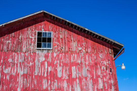 Red Painted Barn Against A Dark Blue Sky In The Hudson River Valley