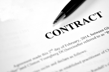 Contract on Paper with Black Pen