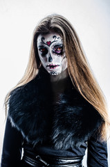 Beautiful portrait of a girl in makeup, sugar skull, halloween   