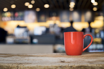 Empty wooden table for present product on coffee shop